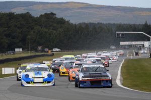 Chris Henderson of Dunedin (Toyota) leads the One Hour field into the first corner of the race