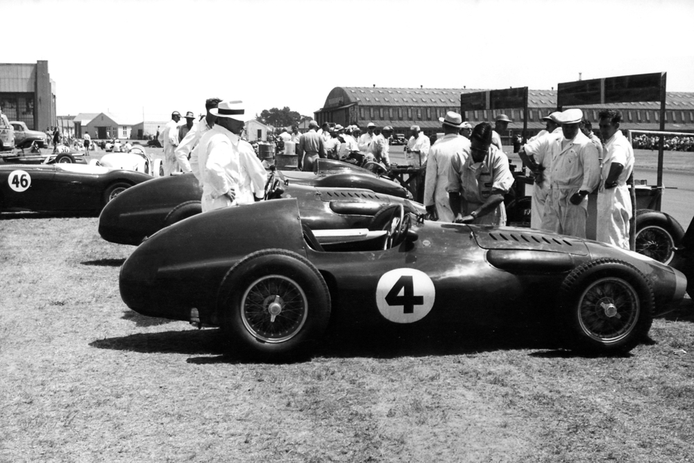 Wigram paddock area 1957. #4 is the Reg Parnell Ferrari Super Squalo 555/860 with the sister car of Peter Whitehead behind. Whitehead won from Jack Brabhams Cooper and Ron Roycrofts Ferrari 375.