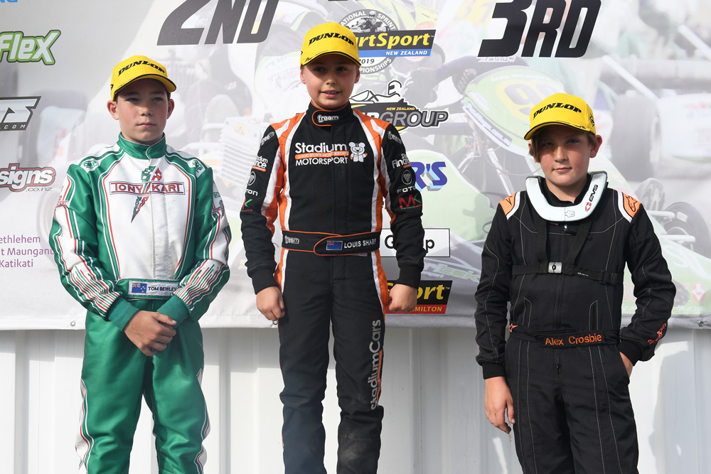 The Vortex Mini ROK Class podium at the 2019 Kartsport NZ Sprint Nationals at Hamilton (from left) Tom Bewley of Hawkes Bay (2nd), Louis Sharp of Christchurch (1st ) and Alex Crosbie of Invercargill (3rd)